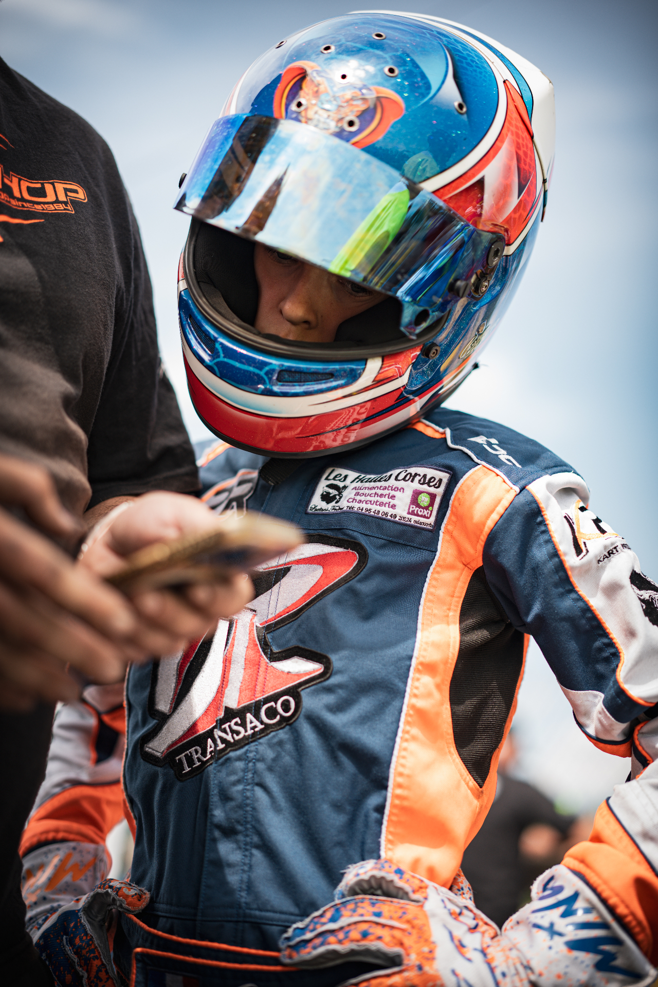Carsten in helmet, paddock